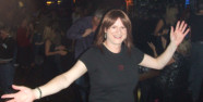 Kim McNelis returning from the dance floor at Embers, Sept. 14, 2007